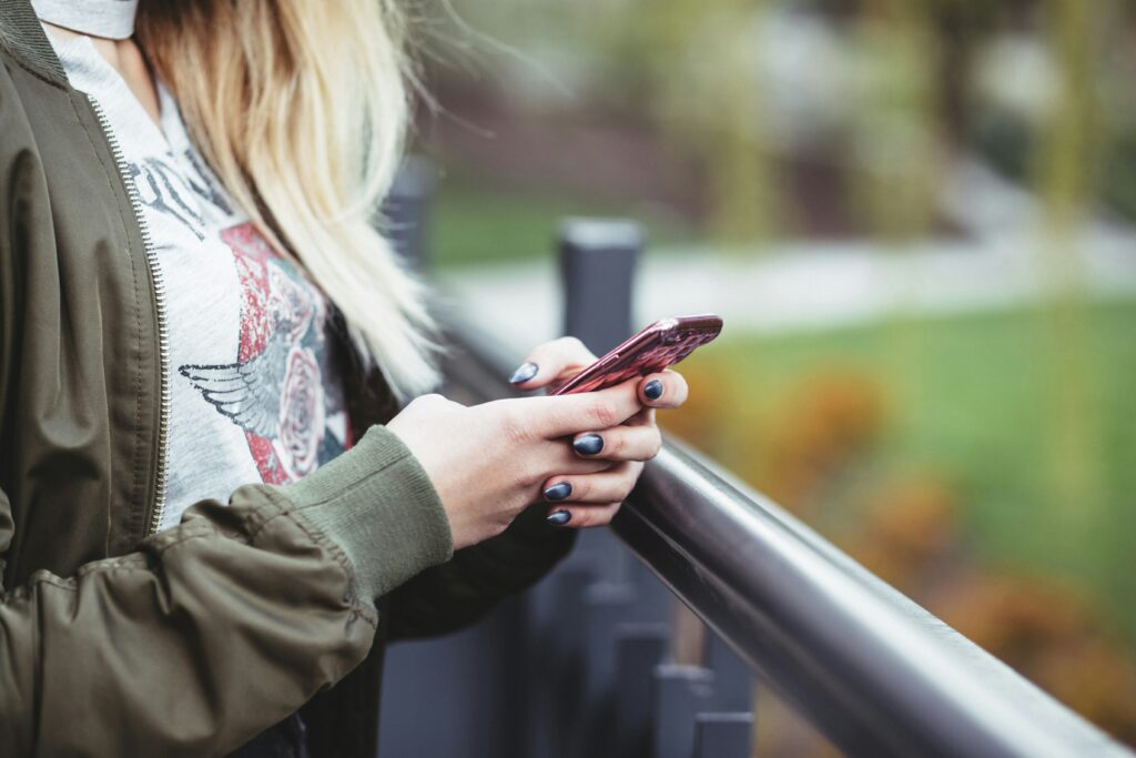 A person checks their credit score on their phone.