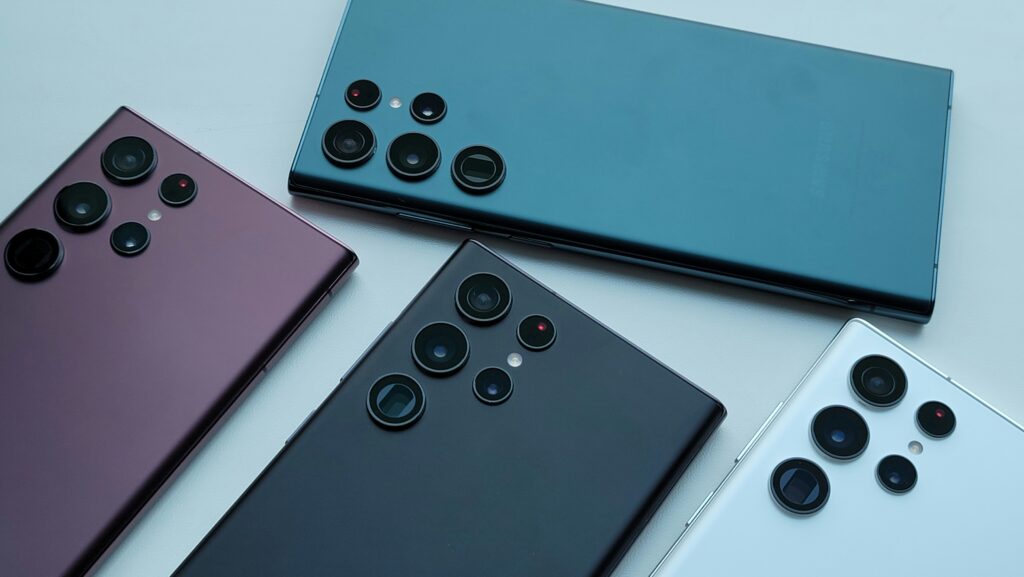 A photo of four mobile phones.