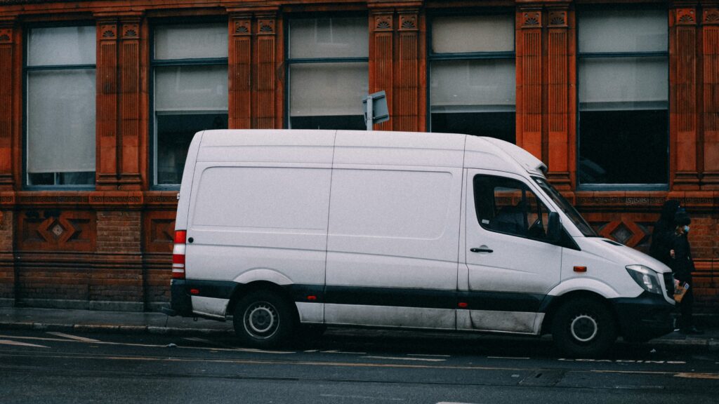 A large van parked on a street.