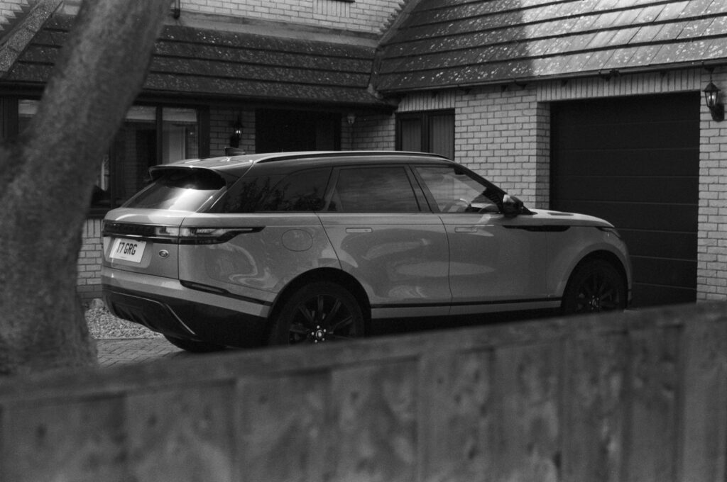 A car parked on a driveway.