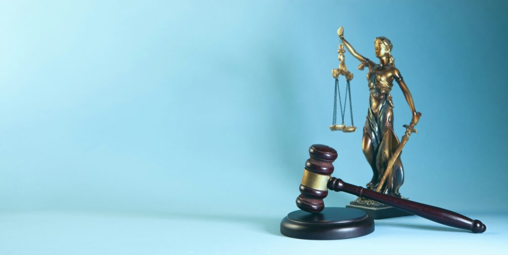 Justice statue and gavel.